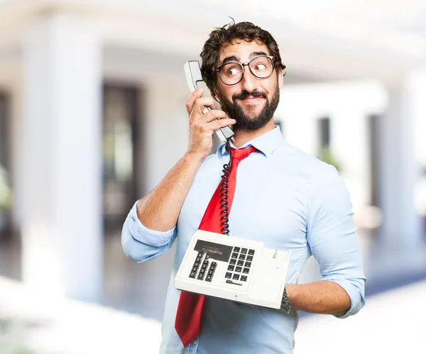 Gek zakenman met oude telefoon — Stockfoto