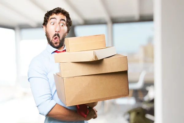 Crazy man with with cardboard boxes — Stock Photo, Image