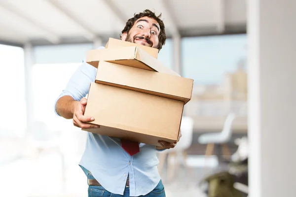 Loco hombre de negocios con cajas — Foto de Stock