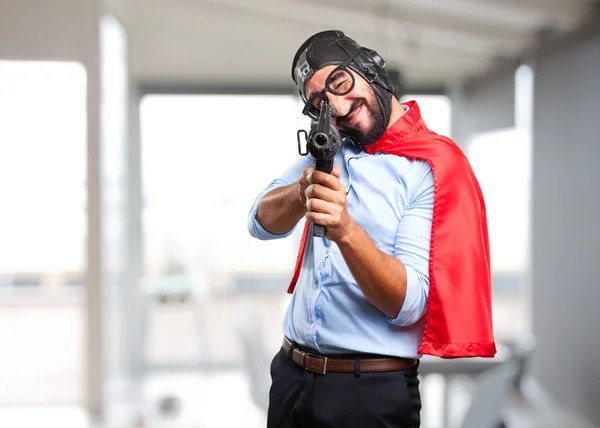 Loco héroe hombre con pistola — Foto de Stock