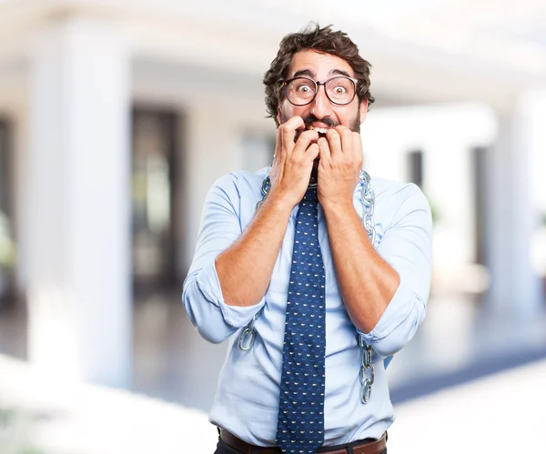 Crazy businessman with worried expression — Stock Photo, Image