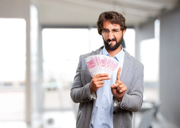 Crazy hippie man with banknotes — Stock Photo, Image