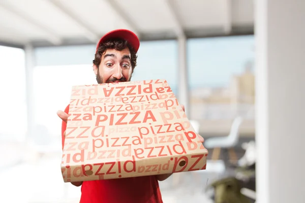 Crazy återförsäljare med stor pizza — Stockfoto