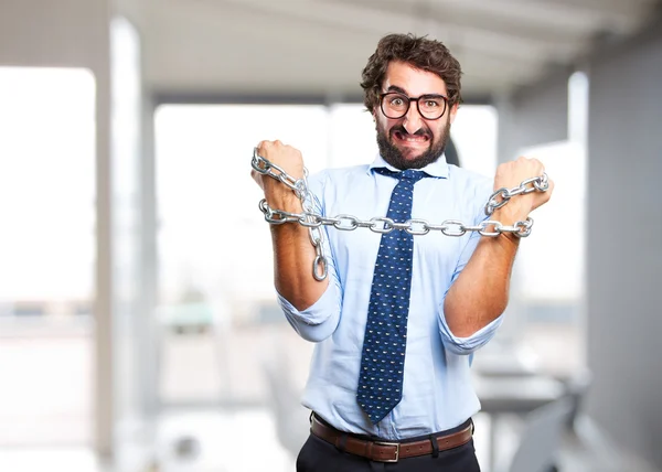 Crazy businessman with iron chain — Stock Photo, Image