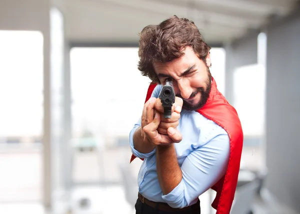 Crazy hero man with pistol — Stock Photo, Image