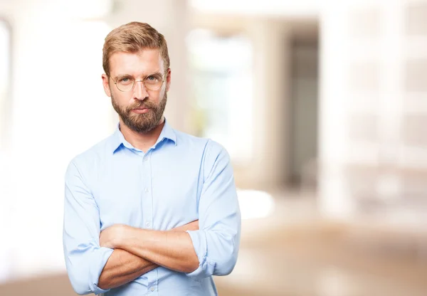 Blond girl with angry expression — Stock Photo, Image