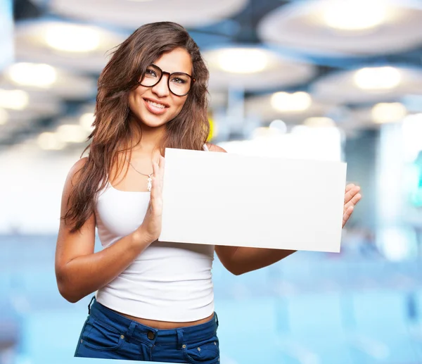 Young black girl with white blank — Stock Photo, Image