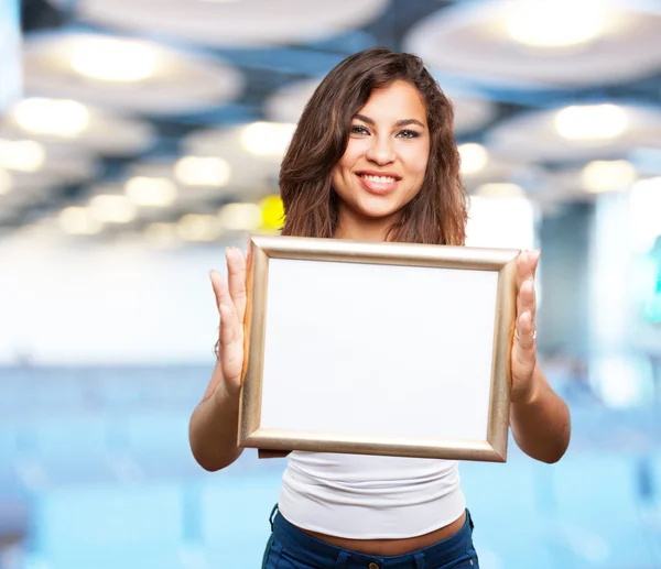 Young black girl with frame — Stock Photo, Image