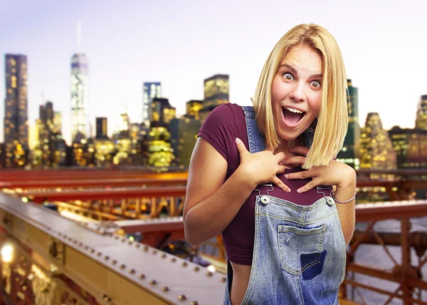 Blond girl with surprised expression — Stock Photo, Image