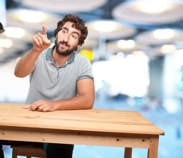 Muž u stolu s blažený výraz — Stock fotografie