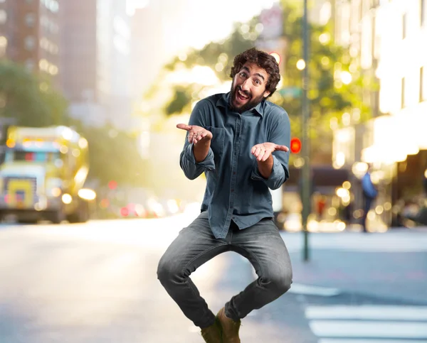 Crazy man jumping with happy expression — Stock Photo, Image