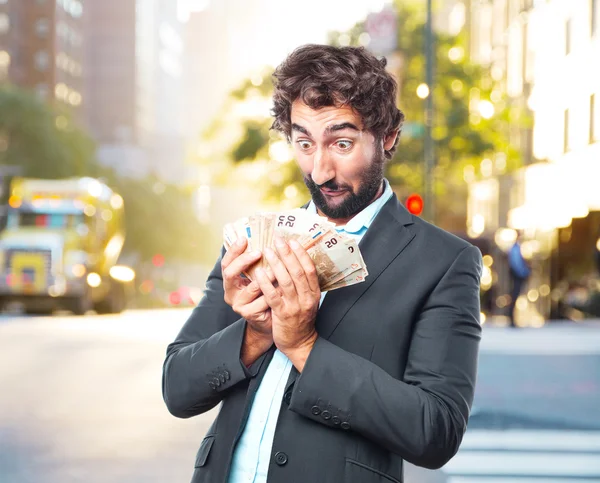 Loco hombre de negocios con billetes — Foto de Stock