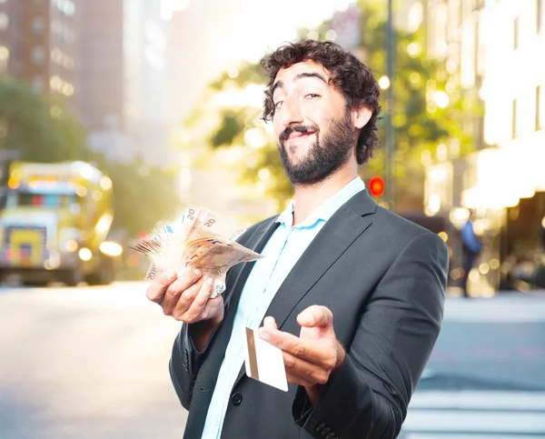 Empresário louco com notas e bolsa — Fotografia de Stock