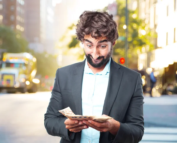 Verrückter Geschäftsmann mit Geldscheinen — Stockfoto