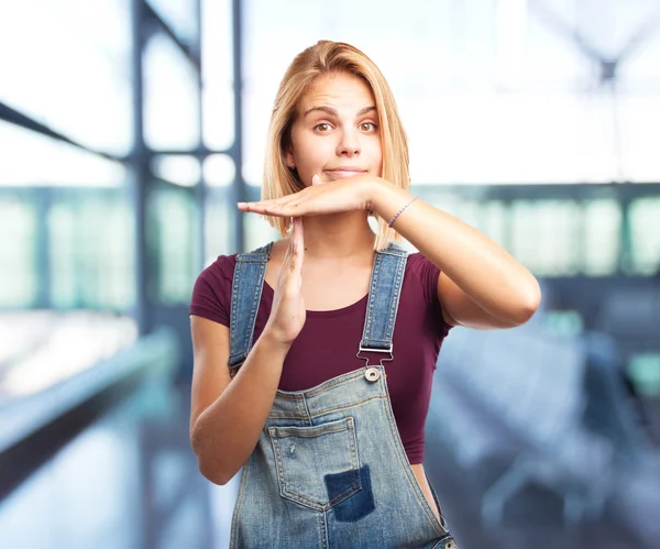 Blond girl with angry expression — Stock Photo, Image