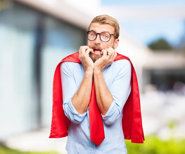 Crazy hero man with worried expression — Stock Photo, Image