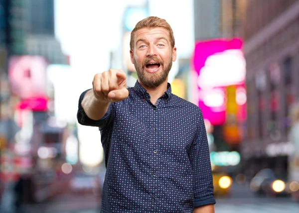 Blond businessman with surprised expression — Stock Photo, Image