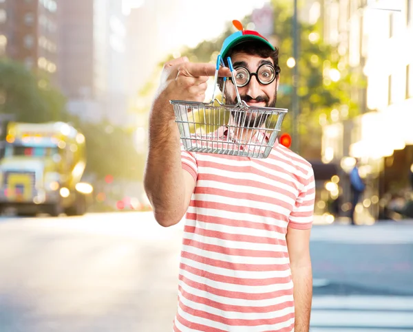 Fool crazy man with shopping cart — Stock Photo, Image