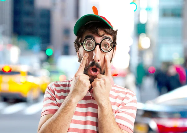 Crazy young man with surprised expression — Stock Photo, Image