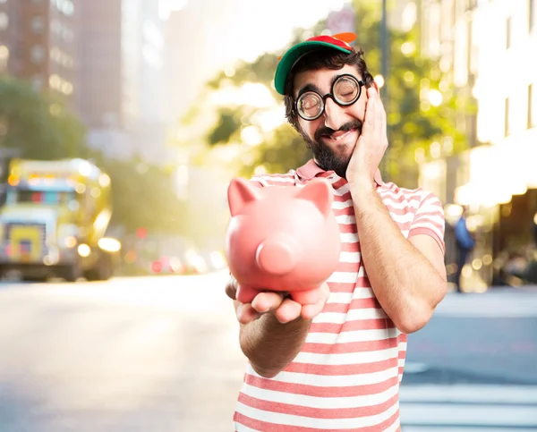 Tolo louco homem com piggybank — Fotografia de Stock