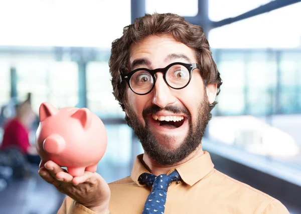 Loco hombre con rosa piggybank — Foto de Stock