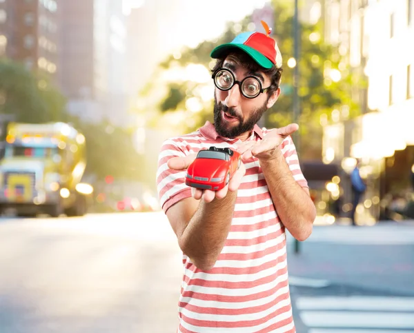 Tolo louco homem com brinquedo carro — Fotografia de Stock