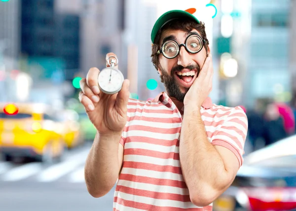 Verrückter junger Mann mit Stoppuhr — Stockfoto