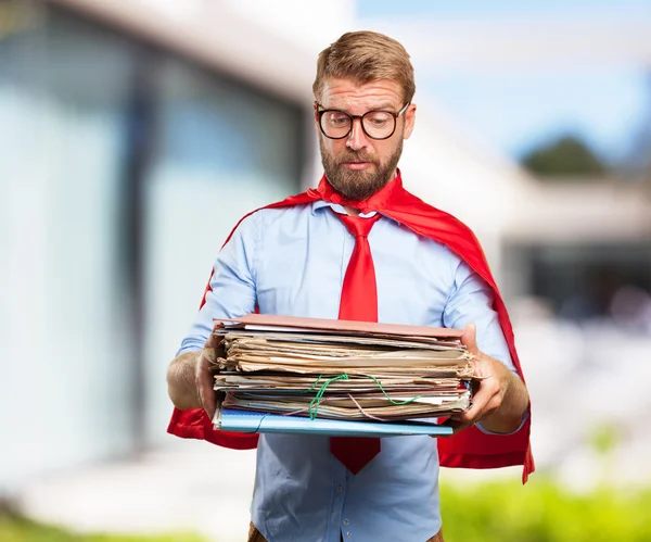 Crazy worried businessman with documents — Stock Photo, Image