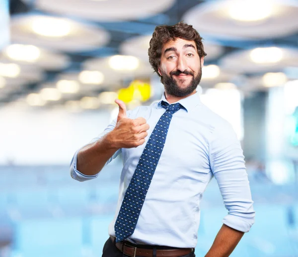 Verrückter Geschäftsmann mit glücklichem Gesichtsausdruck — Stockfoto