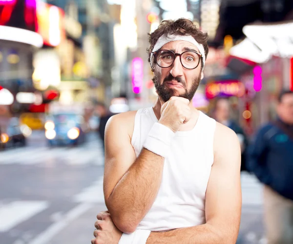 Crazy sportsman with worried expression — Stock Photo, Image