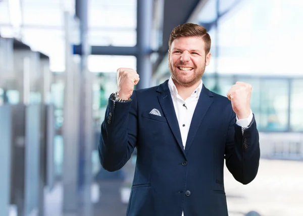 Joven hombre de negocios con expresión feliz —  Fotos de Stock