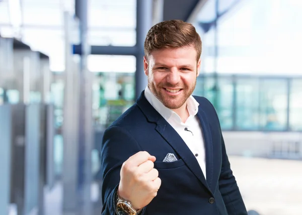 Joven hombre de negocios con expresión feliz —  Fotos de Stock