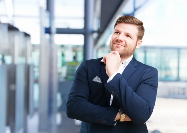 Jonge zakenman met gelukkig expressie — Stockfoto