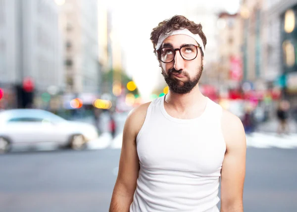 Crazy sportsman with sad expression — Stock Photo, Image