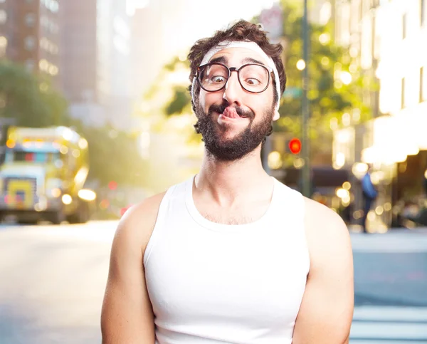 Junger verrückter Sportler mit glücklichem Gesichtsausdruck — Stockfoto