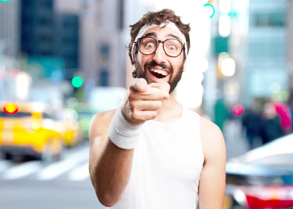 Crazy sportsman with surprised expression — Stock Photo, Image