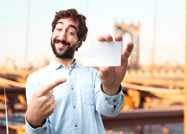 Jovem empresário com branco em branco — Fotografia de Stock