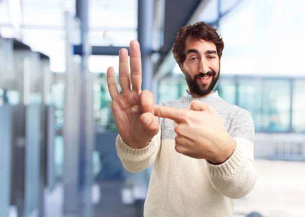 Gek jongeman met gelukkig expressie — Stockfoto