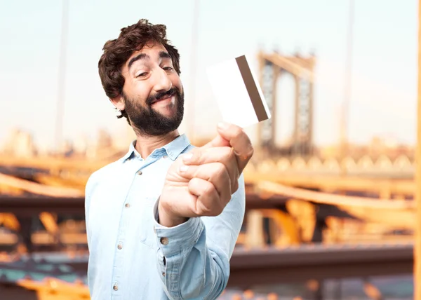 Jovem empresário com cartão de crédito — Fotografia de Stock