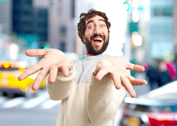 Crazy young man with surprised expression — Stock Photo, Image