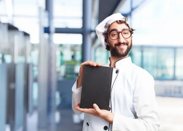 Crazy chef with book — Stock Photo, Image