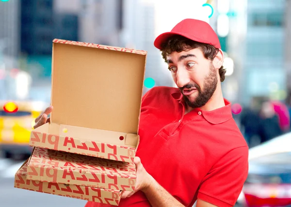 Gek dealer met pizzadozen — Stockfoto