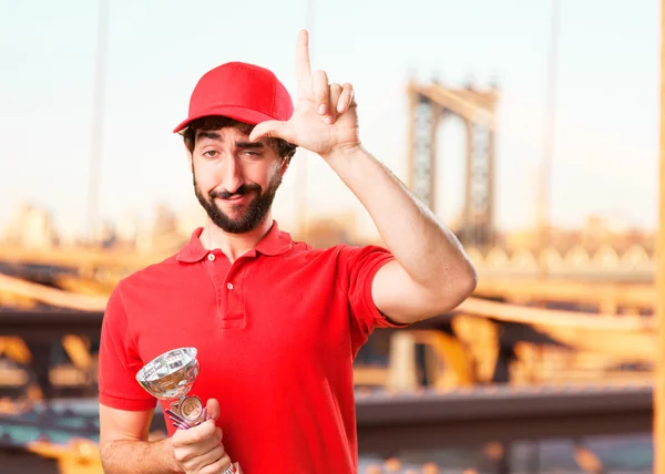 Crazy återförsäljare med sport cup — Stockfoto