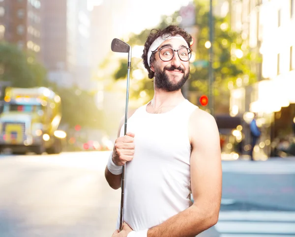Young crazy sportsman with golf club — Stock Photo, Image