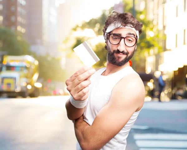 Jeune sportif fou avec carte de crédit — Photo