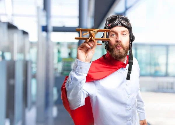 Loira herói homem com brinquedo avião — Fotografia de Stock