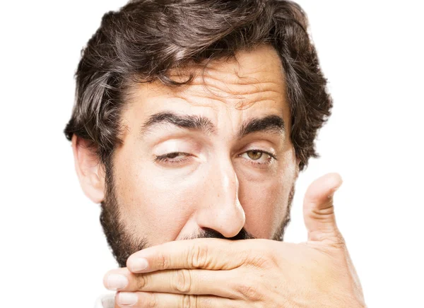 Young cool man covering mouth — Stock Photo, Image