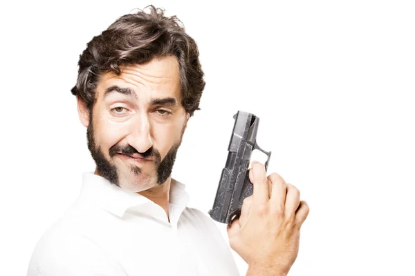 Jovem legal homem com pistola — Fotografia de Stock