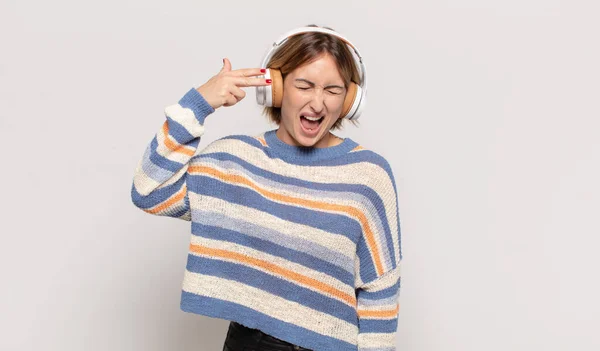 Young Blonde Woman Looking Unhappy Stressed Suicide Gesture Making Gun — Stock Photo, Image