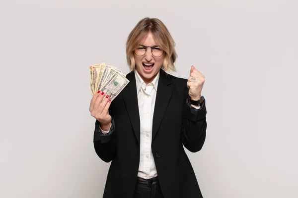 Young Blonde Woman Shouting Aggressively Angry Expression Fists Clenched Celebrating — Stock Photo, Image